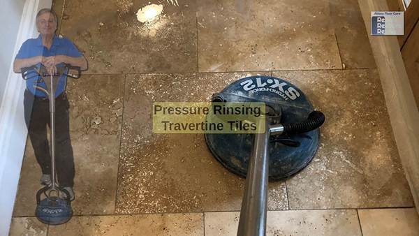 A picture of pressure rinsing travertine tiles